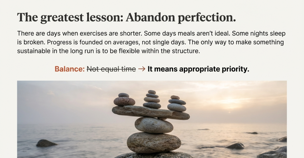 Stacked stones balanced on a rock by the sea at sunrise, symbolizing balance, flexibility, and sustainable progress through appropriate priorities rather than perfection.