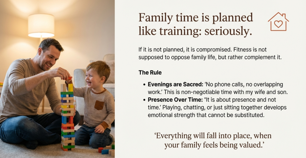 A father and young child playing together at home, representing intentional family time, presence, and the balance between fitness discipline and family life.